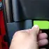 person places ECO Fuel in car